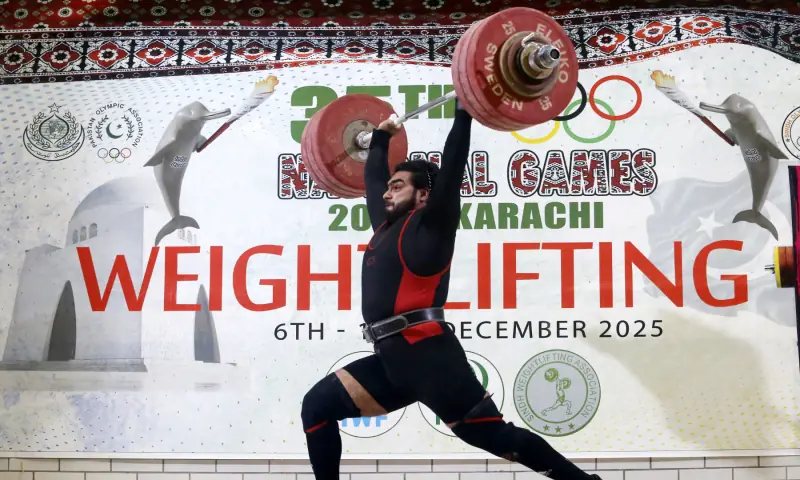 Wapda’s Hanzala Dastagir Butt in action during the men’s clean and jerk in the weightlifting 110kg category on Friday. — Photo via Shakil Adil
