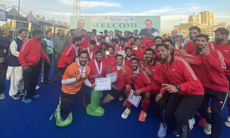 Wapda players celebrate winning the women’s hockey gold medal.