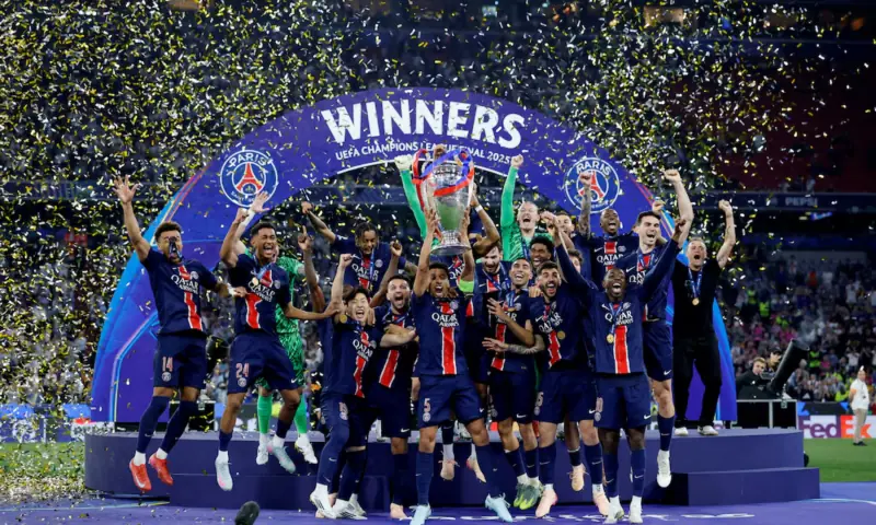  PSG&rsquo;s Marquinhos lifts the trophy as he celebrates with teammates after winning the Champions League on May 31, 2025. &mdash; Reuters/File