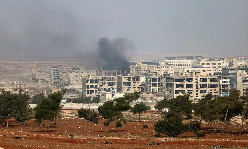 This picture taken on January 8, 2026 shows columns of smoke rising from Aleppo’s Sheikh Maqsoud and Ashrafieh neighborhoods amid intense clashes between government forces and the Kurdish Syrian Democratic Forces (SDF) forces. —AFP