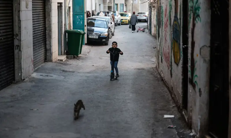  A Palestinian refugee boy plays in Aida refugee camp in Bethlehem, in the Israeli-occupied West Bank on January 11, 2026. &mdash; Reuters 