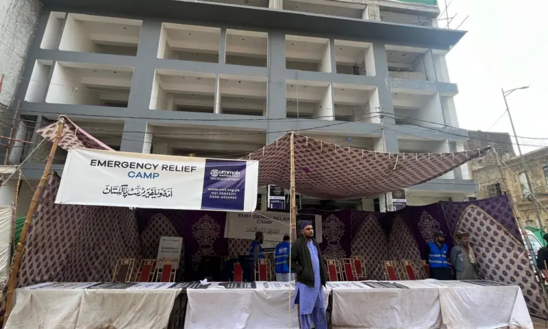  One of the many help desks set up by welfare groups outside Gul Plaza. 