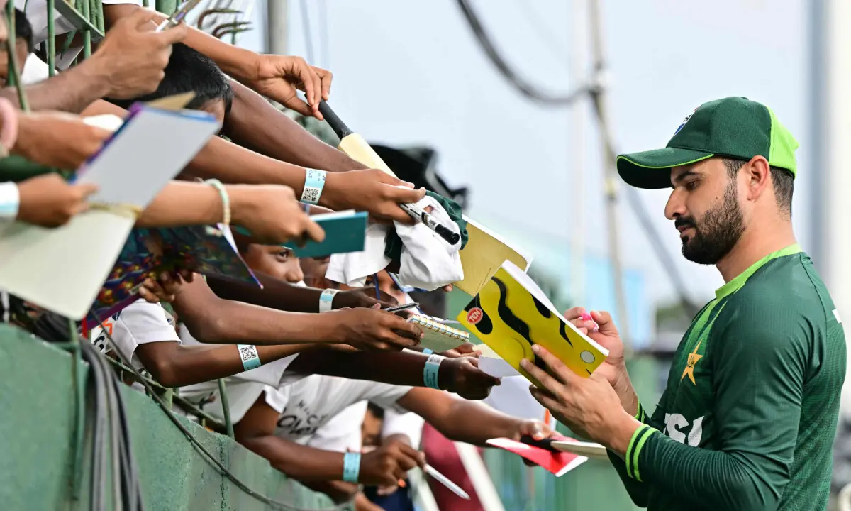  Pakistan&rsquo;s Sahibzada Farhan signs autographs for young fans, before the start of the 2026 ICC Men&rsquo;s T20 Cricket World Cup group stage match between Pakistan and USA at the Sinhalese Sports Club (SSC) Ground in Colombo on February 10, 2026. &mdash; AFP 