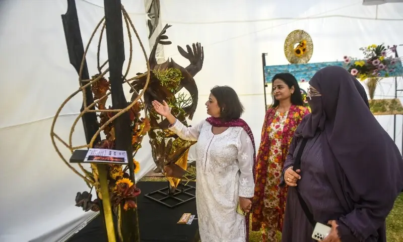 Salma Ansari&rsquo;s floral art depiction of the burning Gul Plaza. &mdash; Fahim Siddiqi / White Star
