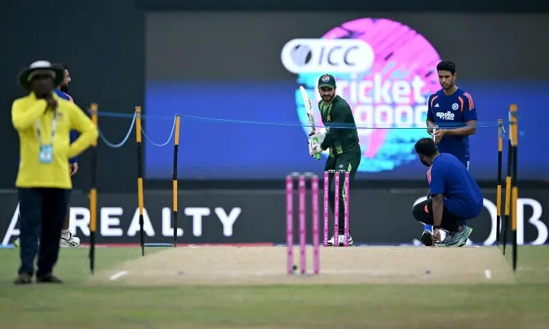  Pakistan&rsquo;s Sahibzada Farhan (C) and India&rsquo;s Shivam Dube (R) warm up before the start of the 2026 ICC Men&rsquo;s T20 Cricket World Cup group stage match between India and Pakistan at the R Premadasa Stadium in Colombo on February 15, 2026. &mdash; AFP 