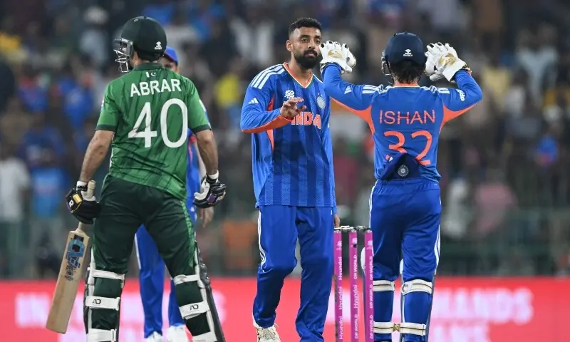 India&rsquo;s Varun Chakravarthy (C) celebrates with wicketkeeper Ishan Kishan after taking the wicket of Pakistan&rsquo;s Abrar Ahmed during the 2026 ICC Men&rsquo;s T20 Cricket World Cup group stage match between India and Pakistan at the R Premadasa Stadium in Colombo on February 15, 2026. &mdash; AFP