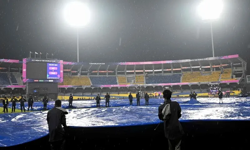  Ground staff cover the field as rain delayed the start of the 2026 ICC Men&rsquo;s T20 Cricket World Cup Super Eight match between Pakistan and New Zealand at the R Premadasa Stadium in Colombo on February 21, 2026. &mdash; AFP 