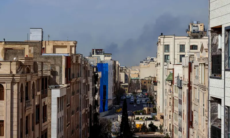 A plume of smoke rises following a reported explosion in Tehran on February 28, 2026. &mdash; AFP