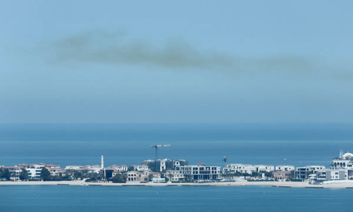 Smoke is left in the sky after blasts were heard in Doha, Qatar, on Feb 28, 2026. &mdash; Reuters