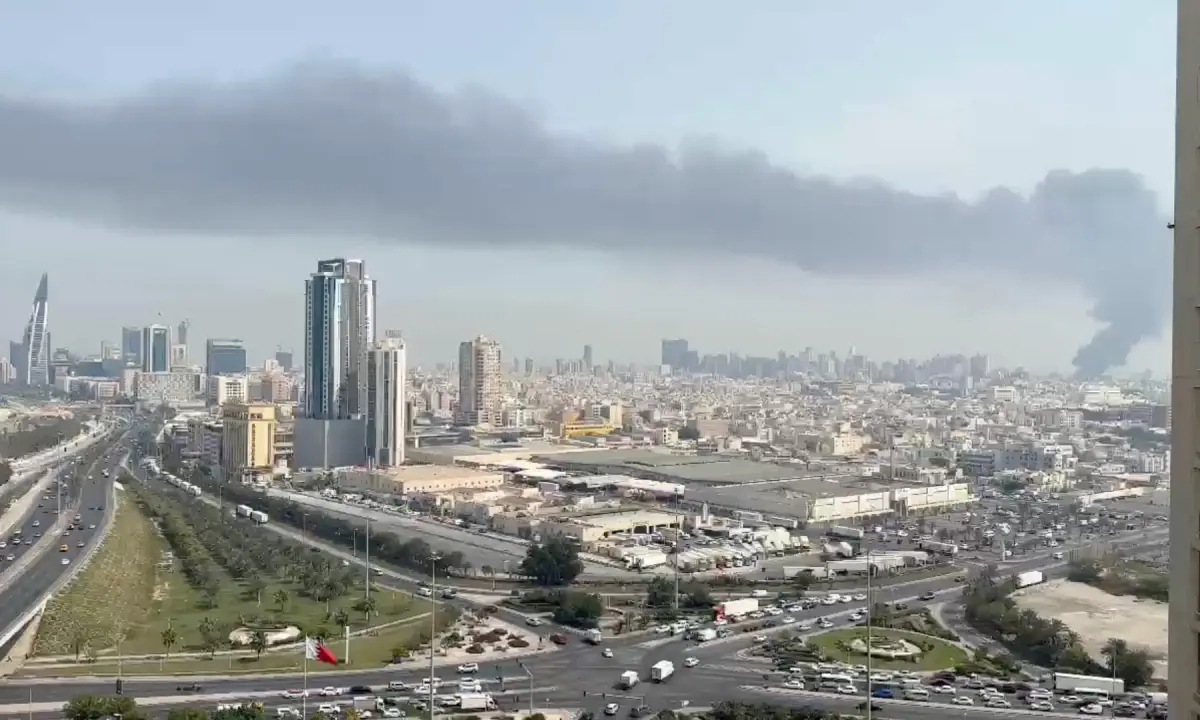   Smoke rises after the state news agency reported missile attack on the service center of the U.S. Fifth Fleet, following strikes by the United States and Israel against Iran, in Manama, Bahrain on February 28, 2026 in this still image obtained from a video. &mdash; via Reuters  