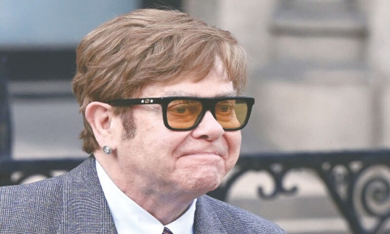 Elton John says newspaper bugged his phone