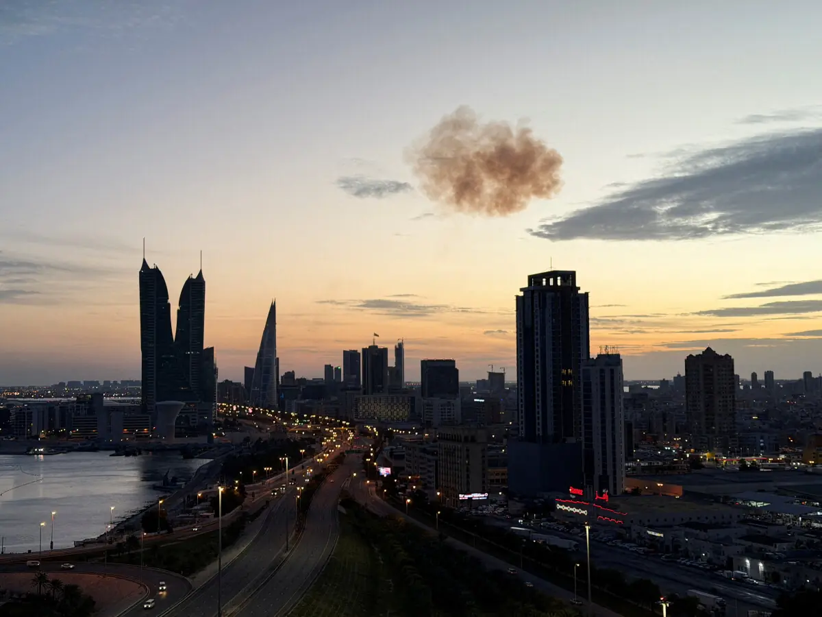 Smoke rises after an Iranian drone was intercepted over the Bahrain Financial Harbour towers, which houses the Israeli embassy, amid the US-Israeli conflict with Iran, in Manama, Bahrain, March 6, 2026. &mdash; Reuters