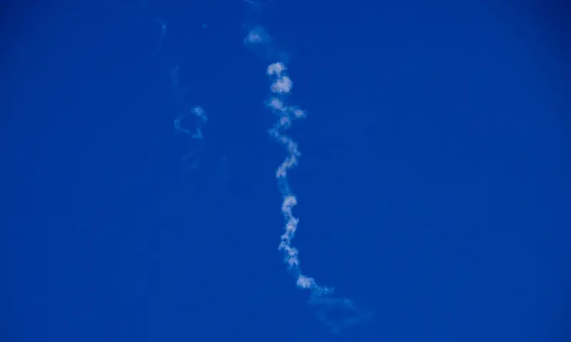 Vapour trails in the sky after Israel intercepted missiles launched from Iran, as seen from Tel Aviv, Israel on March 8, 2026. &mdash; Reuters