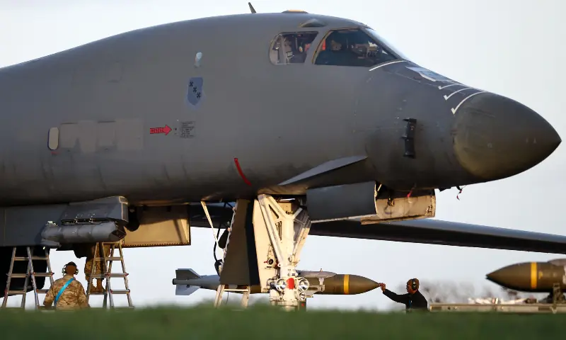 USAF military ground personnel load Joint Direct Attack Munitions (JDAM) into a US Air Force (USAF) B-1 Lancer bomber on the tarmac at RAF Fairford in south-west England on March 11, 2026. &mdash; AFP