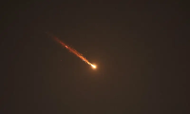 Rocket trails are seen in the sky above the Israeli coastal city of Tel Aviv amid a fresh barrage of Iranian missile attacks on March 11, 2026. &mdash; AFP