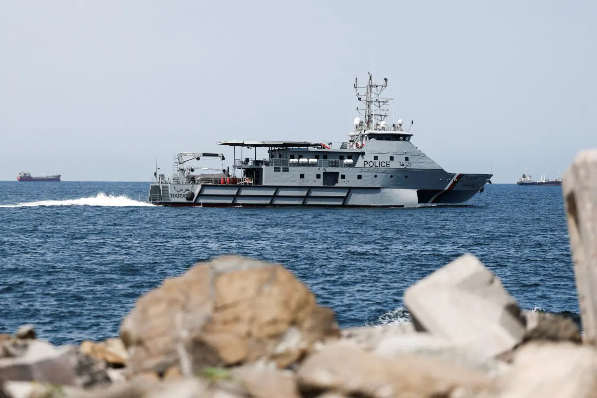 Royal Oman Police Coast Guard patrol boat surveys the area as the traffic is down in the Strait of Hormuz, amid the US-Israeli conflict with Iran, in Muscat, Oman, March 12, 2026. &mdash; Reuters