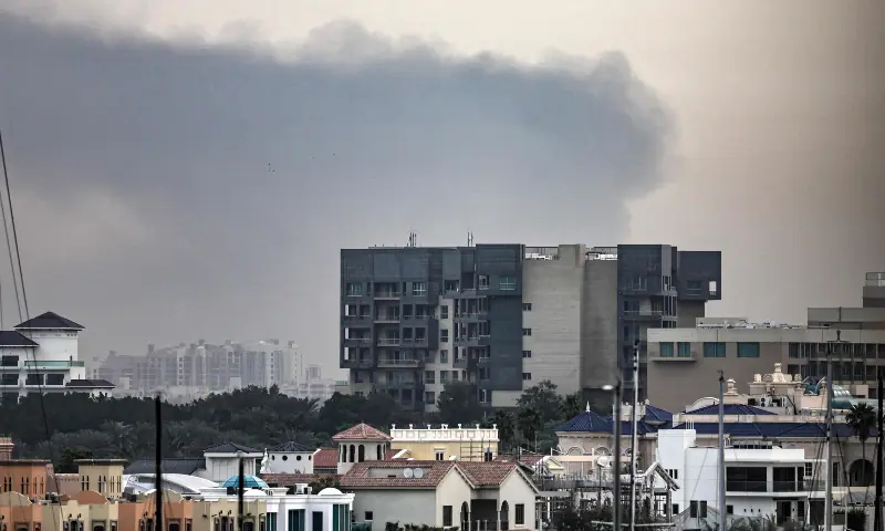 Smoke rises above Dubai on March 13, 2026. &mdash; AFP