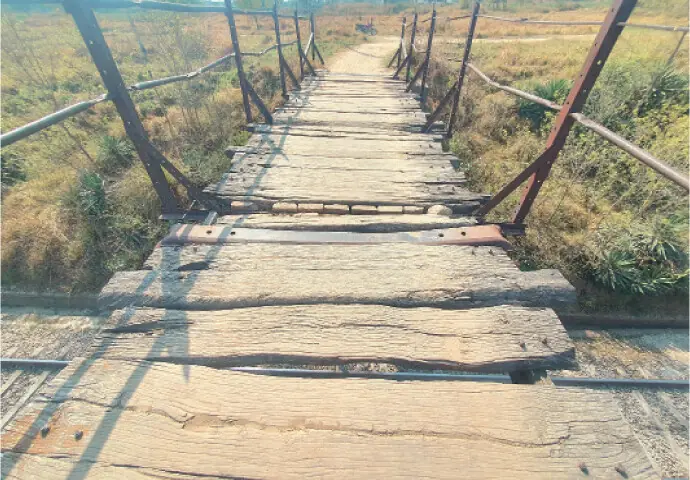  The loosely-attached planks are in need of repair for the safety of the public. 