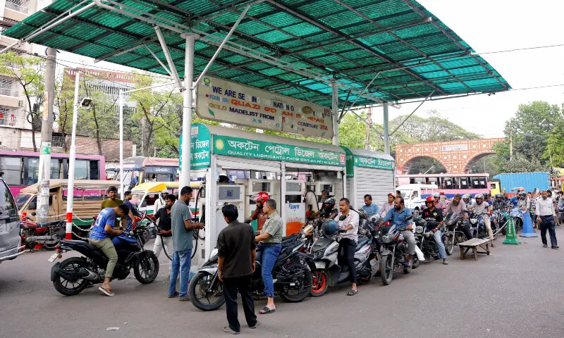 Motorists queue to refuel their motorcycles at a fuel station amid concerns over fuel supply, in Dhaka, Bangladesh on March 15, 2026. &mdash; Reuters
