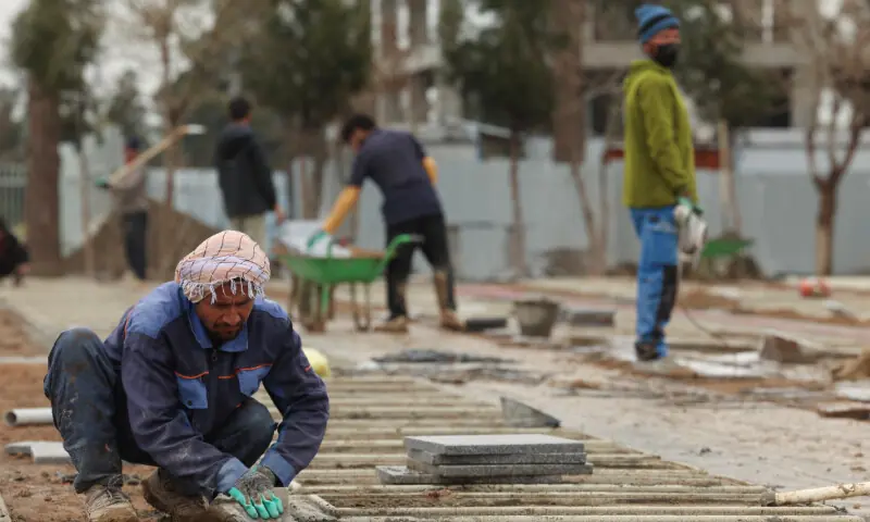 A person works during an expansion of a cemetery in Behesht-e Zahra, amid the U.S.-Israeli conflict with Iran, in Tehran, Iran, March 16, 2026. — Reuters