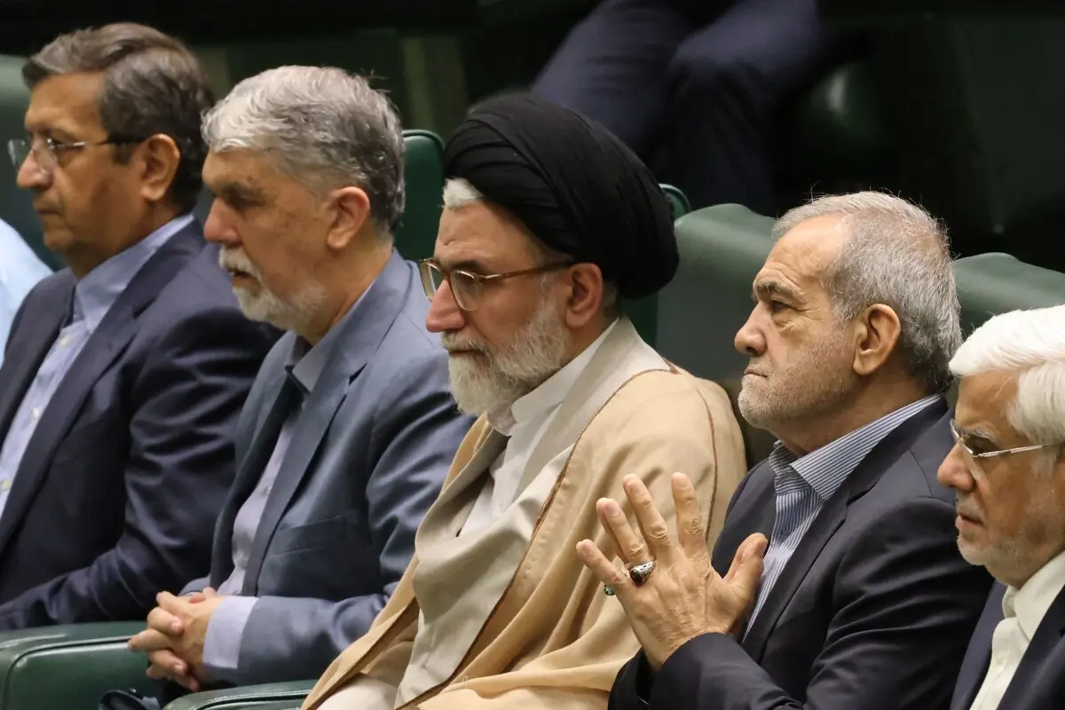 Iran’s Minister of Intelligence Esmail Khatib (C) sits with Iran’s President Masoud Pezeshkian (C-R) before a speech to defend his cabinet selection to members of parliament in the capital Tehran on August 17, 2024. — AFP/File
