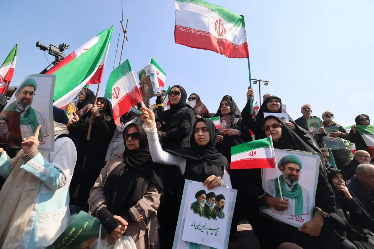Mourners participate in a procession during the funeral of Iran&rsquo;s national security chief Ali Larijani, Basij commander Gholamreza Soleimani and Iranian sailors killed in recent strikes, in Tehran on March 18, 2026. &mdash; AFP