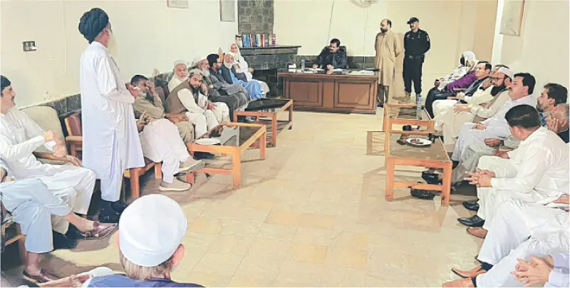  Members of DRCs from across Mansehra attend a performance review meeting at the DPO&rsquo;s office. &mdash; Dawn  