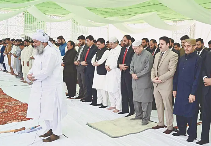 PRESIDENT Asif Ali Zardari offers Eid prayers at Zardari House in Nawabshah.—Dawn