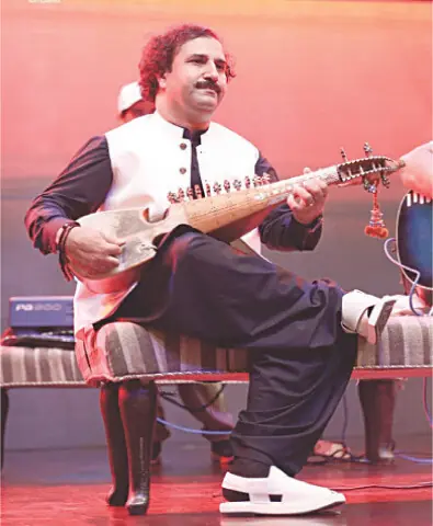  Ustad Gulabkhel Afridi performs at a function. 