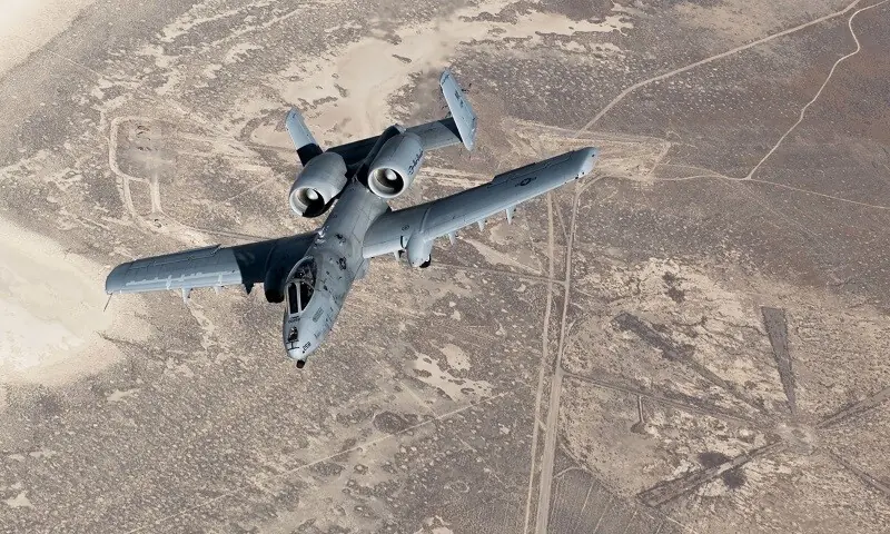 An A-10 Thunderbolt, also known as the Warthog, peels away after receiving fuel. &mdash; AFP