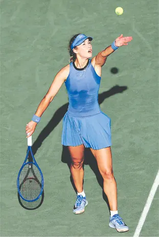 RUSSIA’S Anna Kalinskaya serves to Iva Jovic of Serbia during their Charleston Open quarter-final at the Credit One Stadium.—AFP