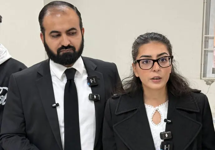 Lawyer Imaan Zainab Mazari-Hazir (right) with her husband and fellow lawyer Hadi Ali Chattha during a court hearing in Islamabad on December 5, 2025: earlier this year, a sessions court sentenced the two lawyers to a combined 17 years in prison under multiple provisions of the Prevention of Electronic Crimes Act 2016 (Peca) linked to posts on the social media platform X | AFP