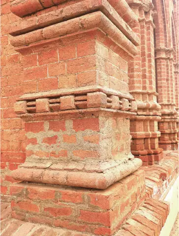 The wide pillars constructed with specially cast bricks to eye-catching designs, add to the beauty, strength and grandeur of the mansion.
