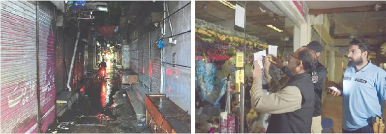  A view of closed shops in a market in Rawalpindi as Magistrate Ghulam Murtaza Chandio seals the F-6 flower market for violating official closure timings in Islamabad on Tuesday. &mdash; Photos by Online & Mohammad Asim 