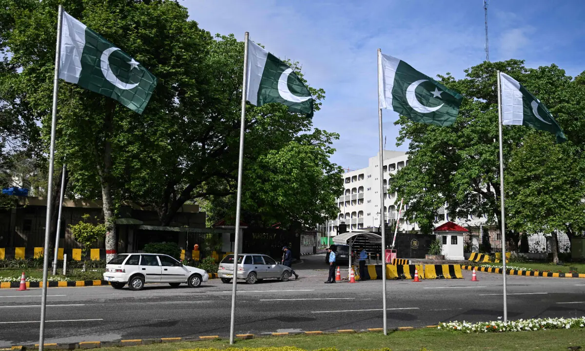 Security personnel inspect vehicles entering the Foreign Ministry office in Islamabad on April 9, 2026. &mdash; AFP