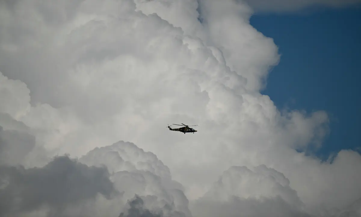 An army helicopter flies over the Red Zone area in Islamabad on April 9, 2026. &mdash; AFP