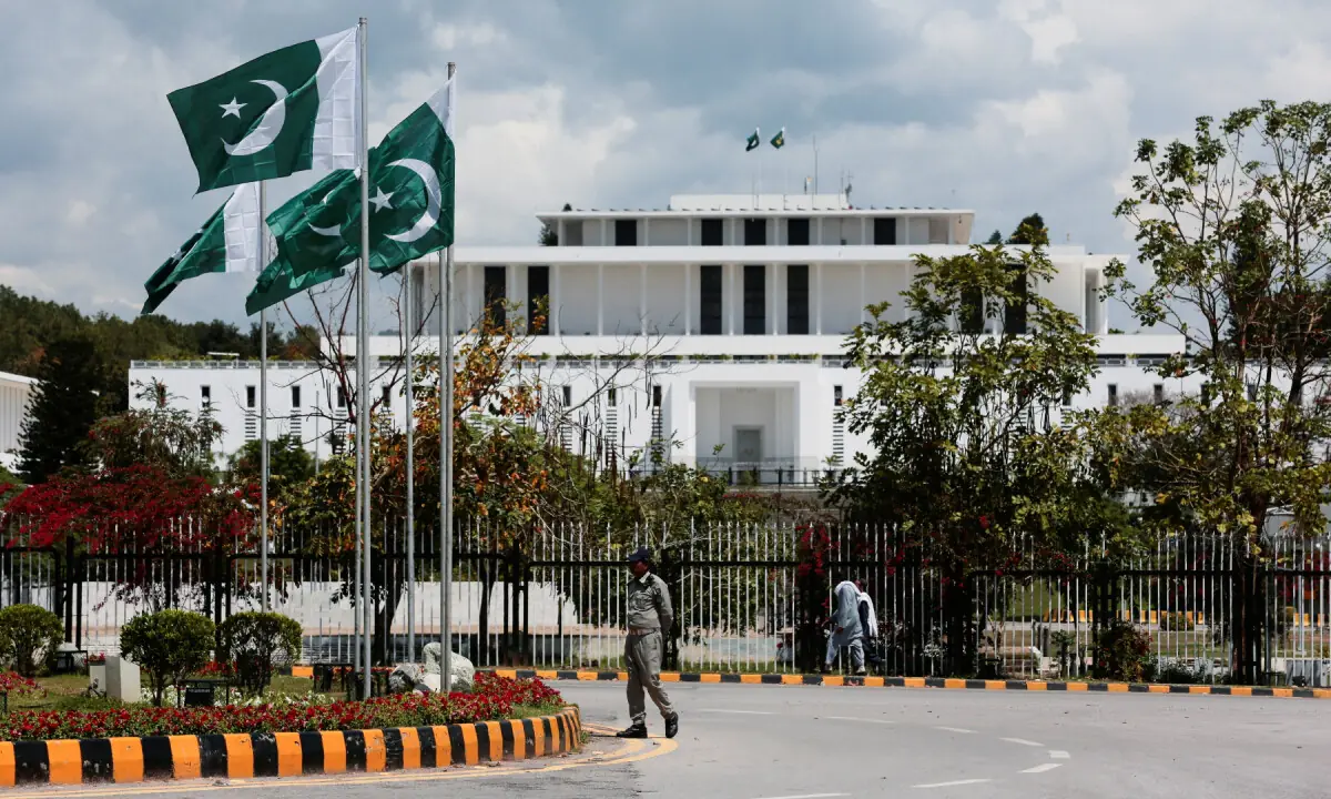 A security guard patrols outside the Aiwan-i-Sadr (Presidential Palace) ahead of Iran-US talks in Islamabad, Pakistan, April 9, 2026. &mdash; Reuters