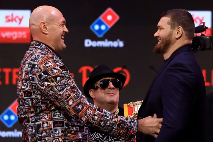 BRITAIN’S Tyson Fury (L) faces off with Arslanbek Makhmudov of Russia during a press conference.—AFP