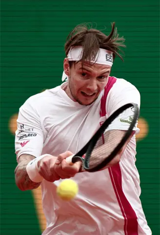 KAZAKHSTAN’S Alexander Bublik plays a backhand return against Carlos Alcaraz of Spain during their Monte Carlo Masters quarter-final at the Monte-Carlo Country Club on Friday.—AFP