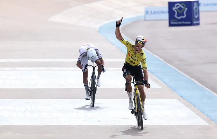   TEAM Visma-Lease a Bike&rsquo;s Belgian rider Wout van Aert celebrates after winning the Paris-Roubaix ahead of UAE Team Emirates XRG&rsquo;s Tadej Pogacar of Slovenia at the Velodrome Andre-Petrieux on Sunday.&mdash;AFP  