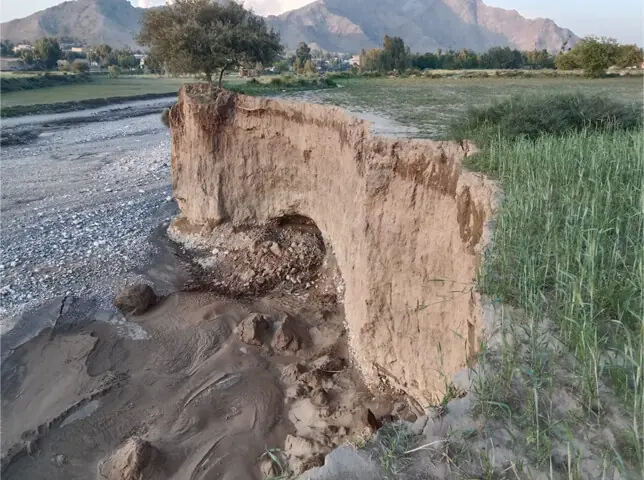   Flash floods triggered by recent rains in Atokhel Khwar damaged fertile agricultural land in Haleemzai tehsil of Mohmand tribal district. &mdash; Dawn   