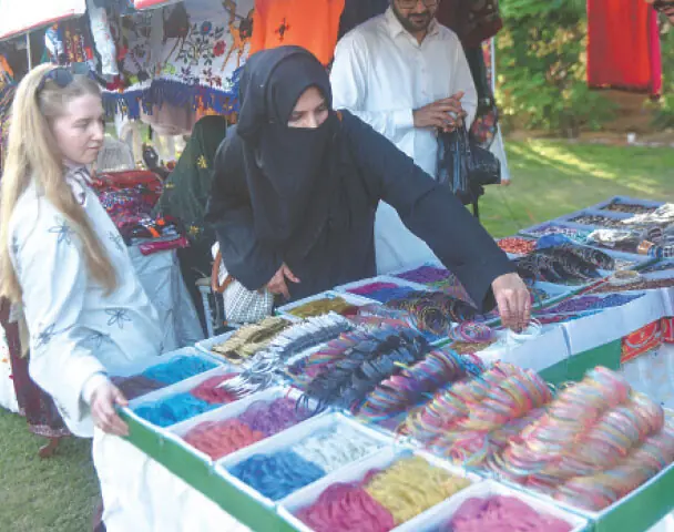  Glittering glass bangles from Hyderabad attract buyers. &mdash;Fahim Siddiqi / White Star 