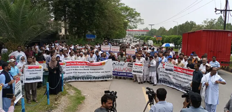  Tenure track system (TTS) faculty members at a protest against the Higher Education Commission (HEC) on July 18, 2023 in Islamabad: even if the TTS pay scale issue is resolved, the much bigger challenge awaits &mdash; our higher education system is broken | X: @fapuasa 