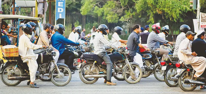   Millions of people in Pakistan rely on motorcycles to commute, deepening fuel dependence | White Star  