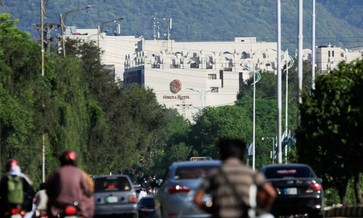 Vehicles ply on a road leading to Serena hotel in Islamabad on April 20, 2026. &mdash; Reuters