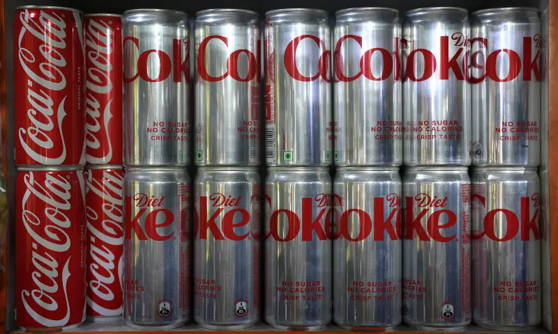 Coca-Cola Diet Coke cans on display for sale inside a shop in New Delhi, India on April 22, 2026. &mdash; Reuters