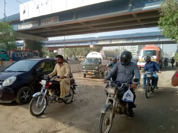  WITH the veneer of tarmac stripped away, University Road is a real gauntlet for commuters. But spare a thought for pedestrians, such as students, who have to cross the road on foot.&mdash;Photo by the writer 