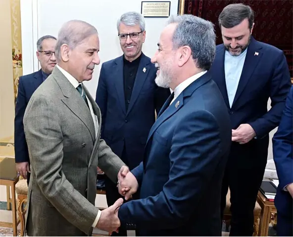  PRIME Minister Shehbaz Sharif shakes hands with Iran&rsquo;s Foreign Minister Abbas Araghchi at PM House.&mdash;PPI 