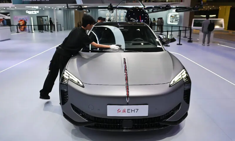 A Hongqi EH7 is displayed at the Beijing Auto Show in Beijing on April 26, 2026. &mdash; AFP