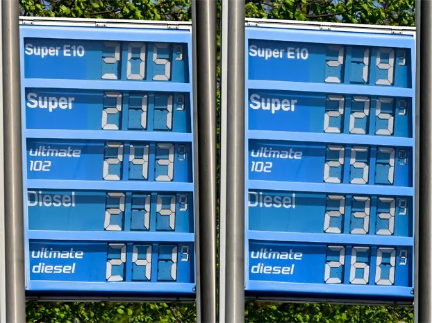  This combination of pictures shows a pricing board at a gas station in Berlin, with gas prices displayed before noon (L) and after noon last week. Oil and natural gas prices have surged since the end of February 2026, when the United States and Israel began attacking Iran, plunging the Middle East into turmoil.&mdash;AFP 